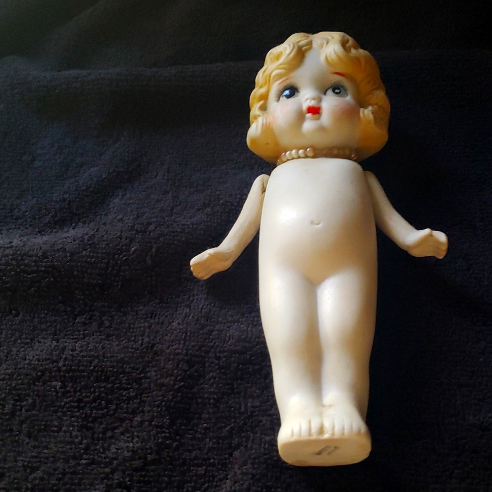 Vintage doll, porcelain..the mother to the smaller one